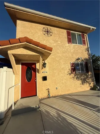 a front view of a house with parking