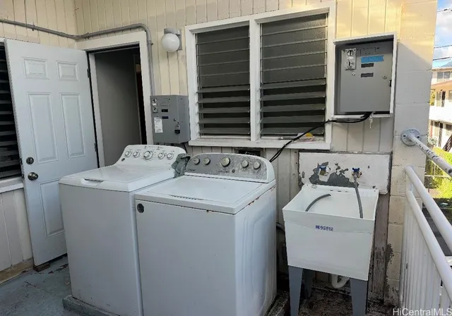 a utility room with dryer and washer