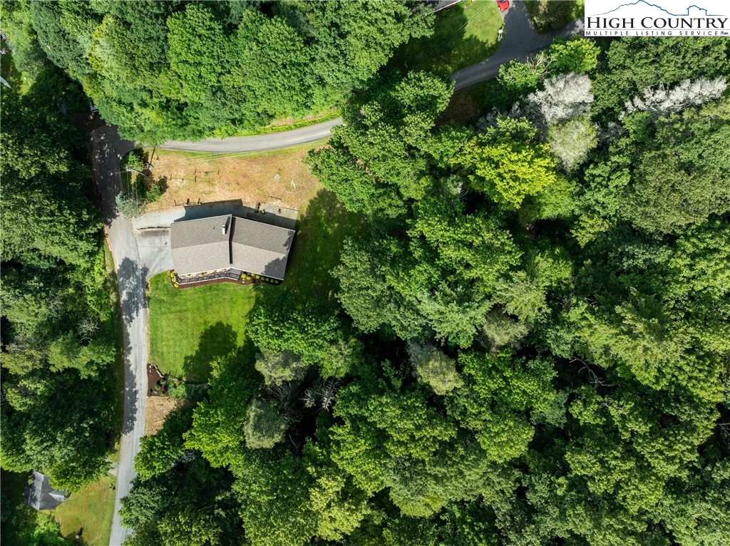 956 Jordan V Cook Road Boone, NC 28607 - Photo 50 of 50 an aerial view of a house with a yard