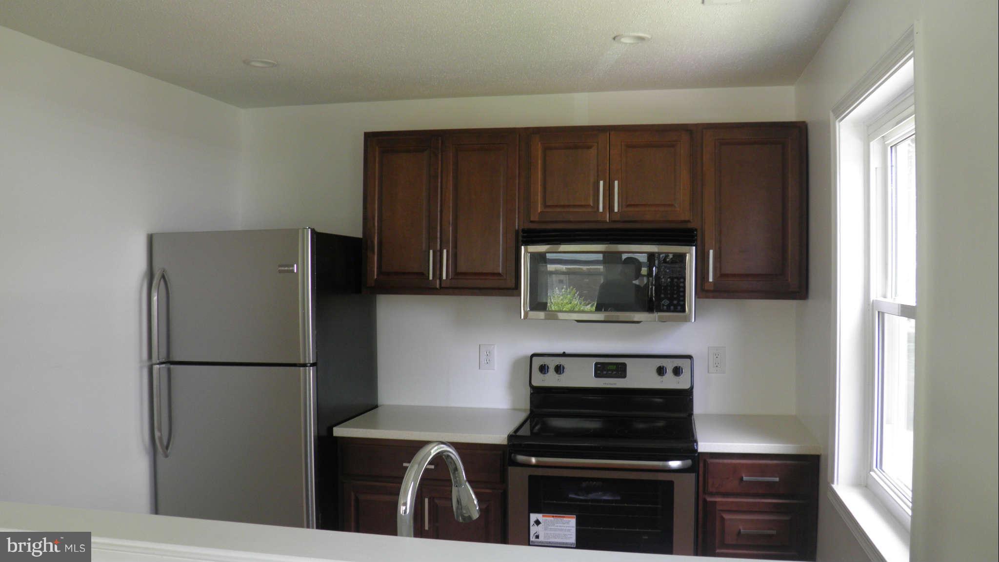 9114 Ardwick Ardmore Road Springdale, MD 20706 - Photo 14 of 30 Kitchen