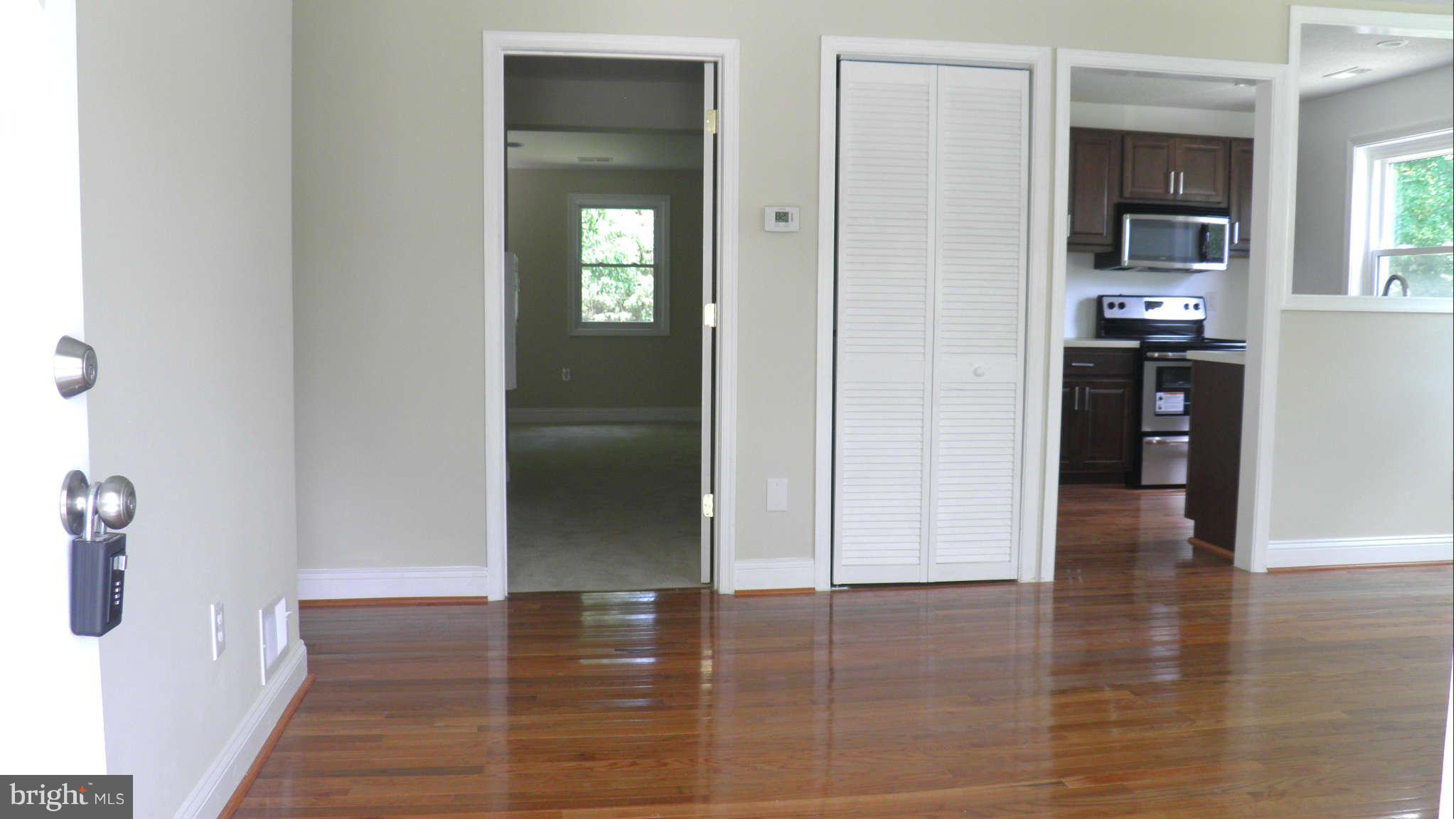 9114 Ardwick Ardmore Road Springdale, MD 20706 - Photo 19 of 30 Living Room