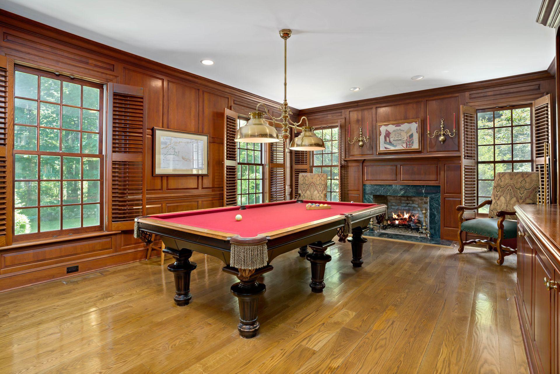 318 Ridgefield Road Wilton, CT 06897 - Photo 11 of 51 a room with pool table flat screen tv and windows
