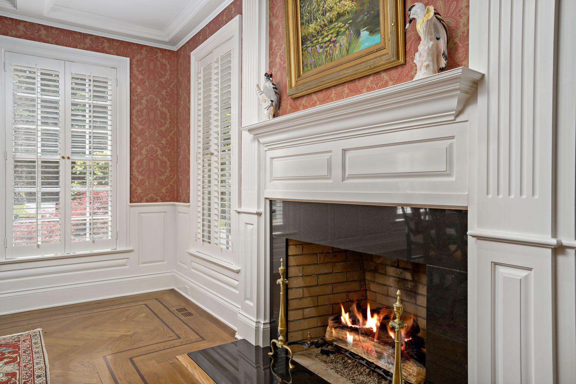 318 Ridgefield Road Wilton, CT 06897 - Photo 14 of 51 a living room with furniture and a fireplace