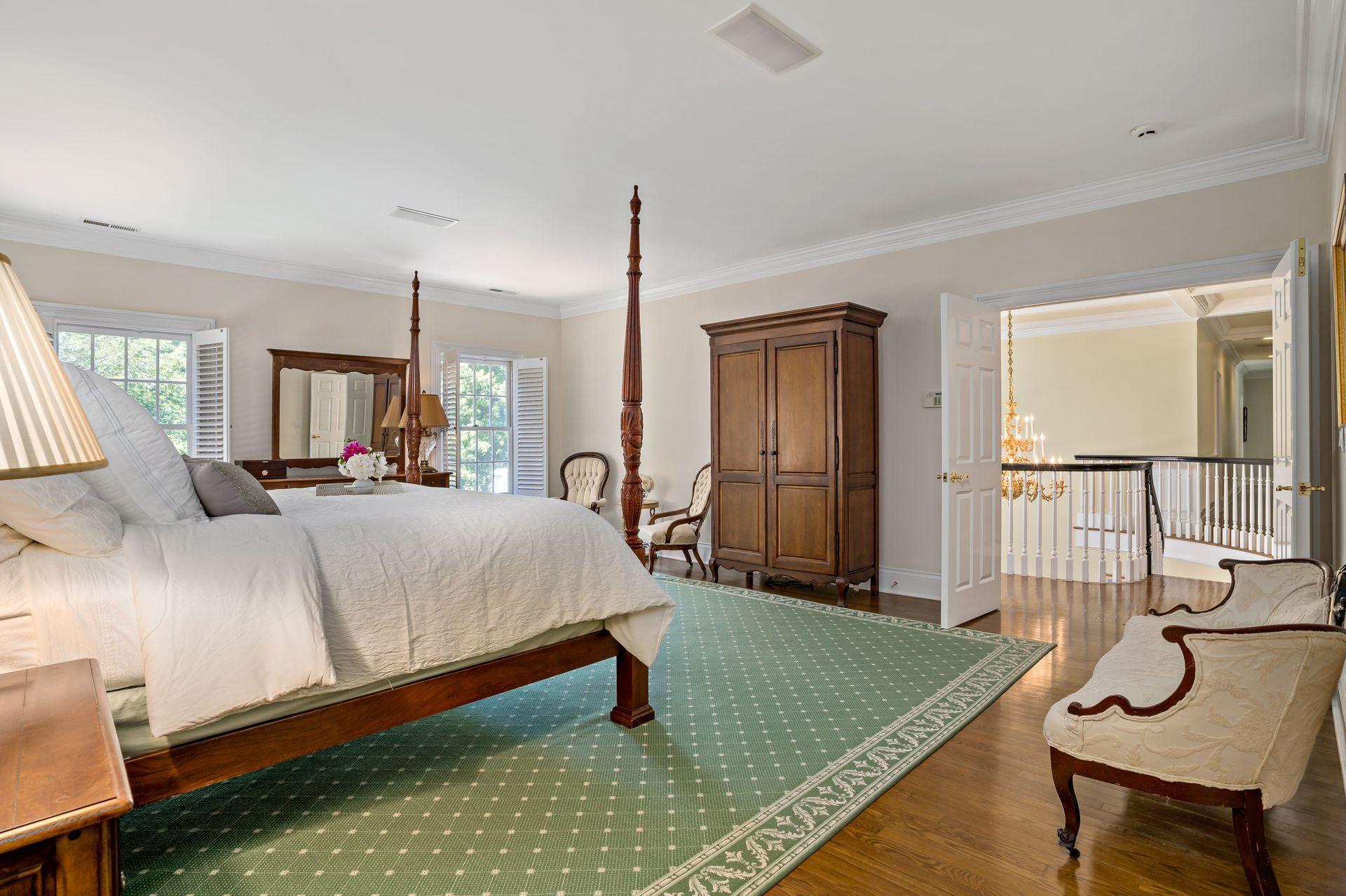318 Ridgefield Road Wilton, CT 06897 - Photo 33 of 51 a bed room with a bed window and a table