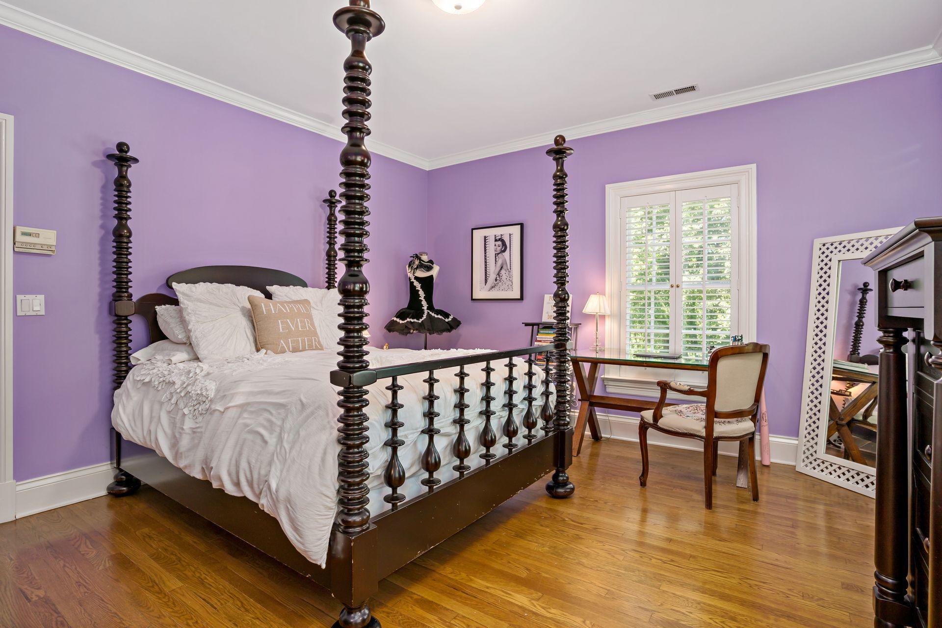 318 Ridgefield Road Wilton, CT 06897 - Photo 41 of 51 a bedroom with a bed table chair and a window