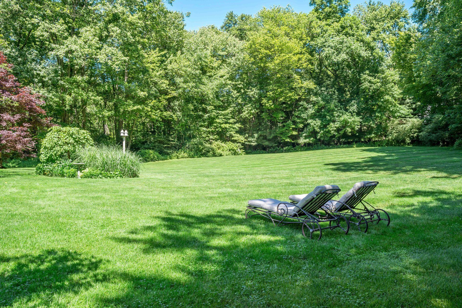 318 Ridgefield Road Wilton, CT 06897 - Photo 46 of 51 a view of a golf course with chairs
