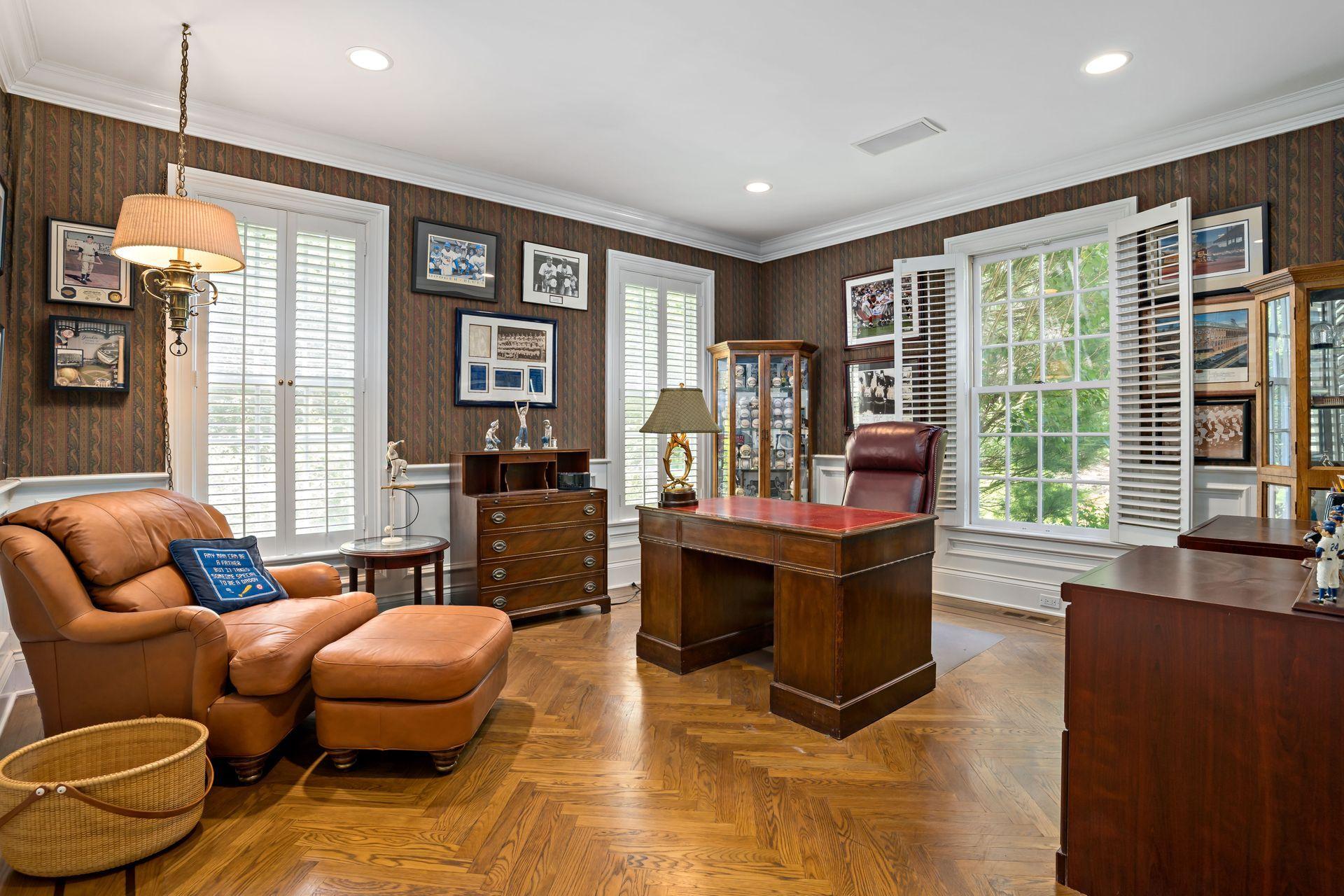 318 Ridgefield Road Wilton, CT 06897 - Photo 9 of 51 a living room with furniture and a floor to ceiling window