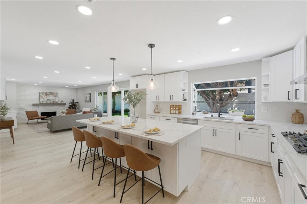 25032 Crystal Circle Lake Forest, CA 92630 - Photo 12 of 54 a kitchen with appliances a sink and counter space