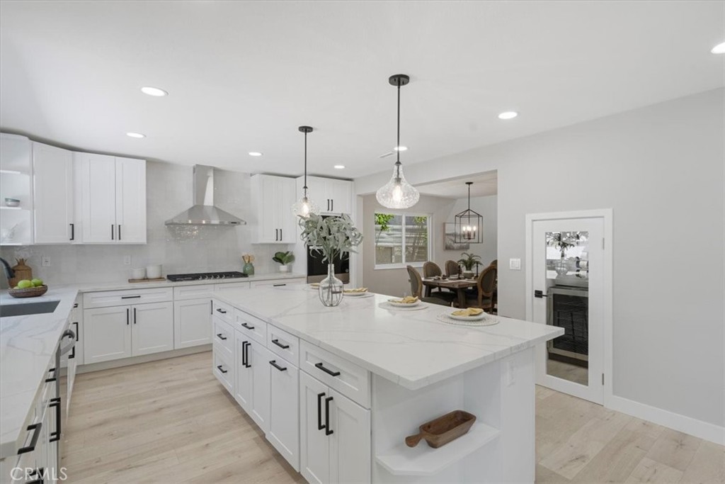 25032 Crystal Circle Lake Forest, CA 92630 - Photo 13 of 54 a kitchen with sink a stove and cabinets