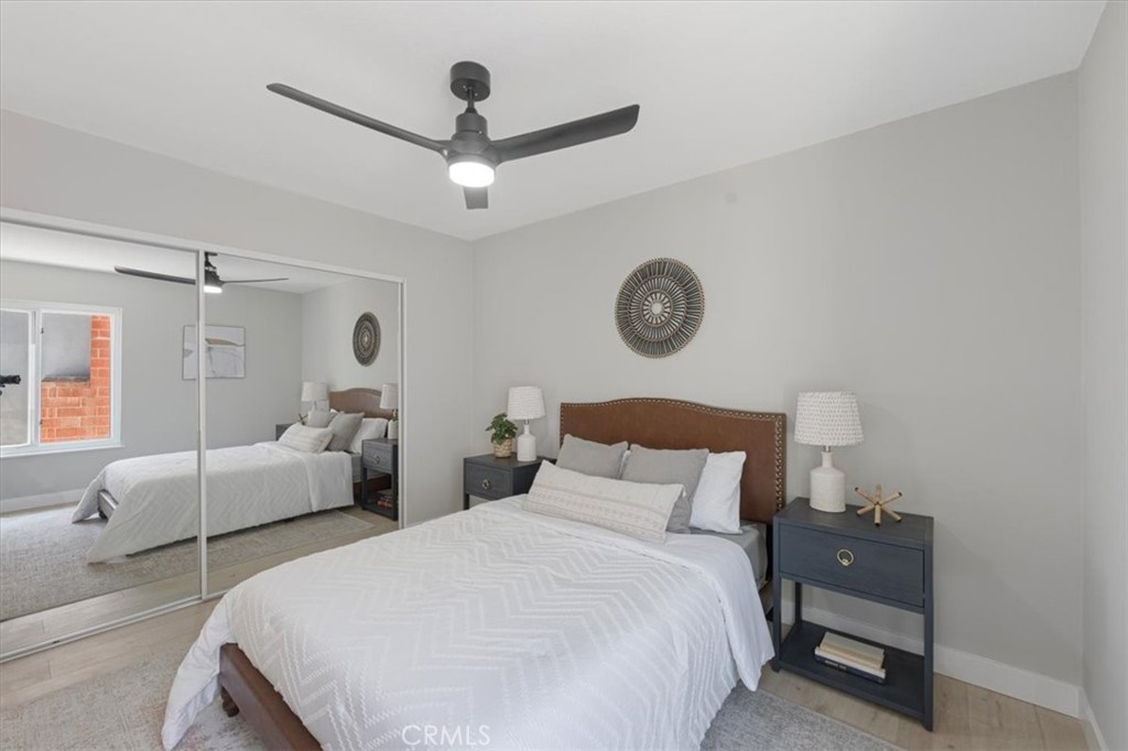 25032 Crystal Circle Lake Forest, CA 92630 - Photo 32 of 54 a bedroom with bed and a window