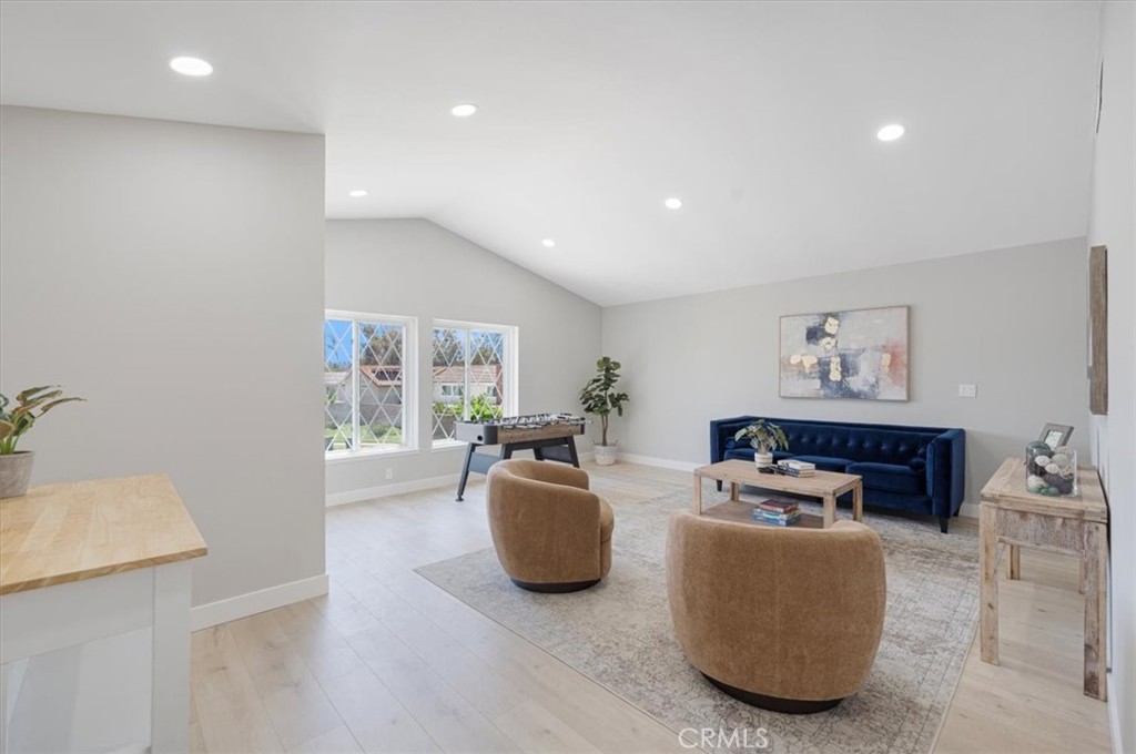 25032 Crystal Circle Lake Forest, CA 92630 - Photo 35 of 54 a living room with furniture and a window