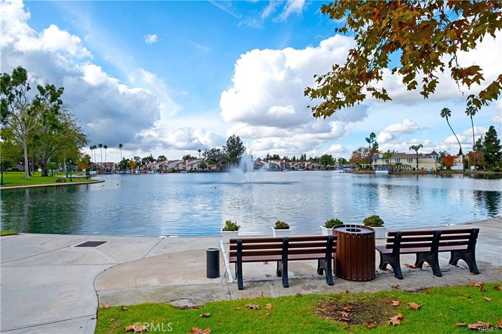 25032 Crystal Circle Lake Forest, CA 92630 - Photo 42 of 54 a view of a lake with outdoor seating