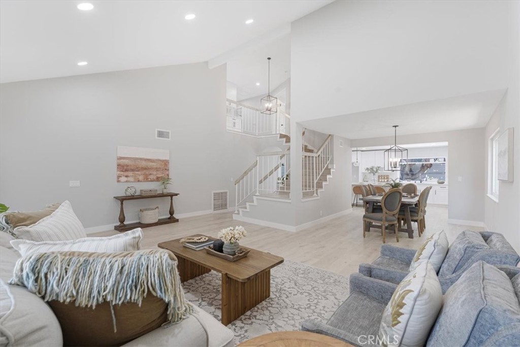 25032 Crystal Circle Lake Forest, CA 92630 - Photo 6 of 54 a bedroom with furniture and a chandelier