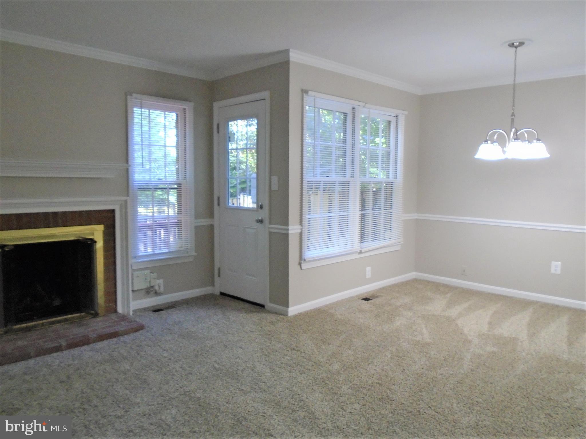 1914 Duffield Lane Alexandria, VA 22307 - Photo 12 of 50 a view of an empty room with window and fire place