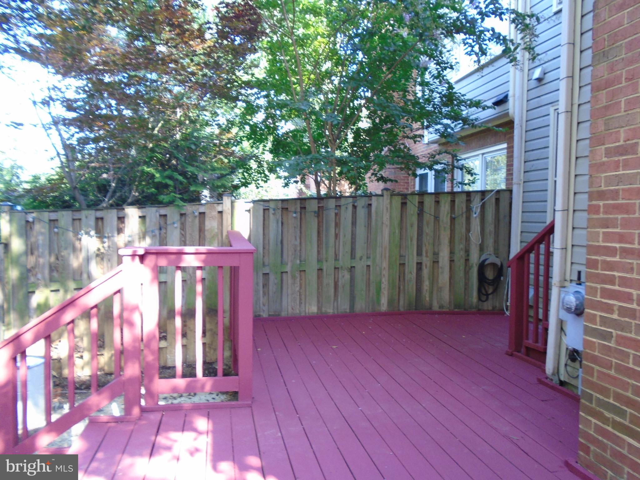 1914 Duffield Lane Alexandria, VA 22307 - Photo 15 of 50 a view of a deck with furniture and wooden floor