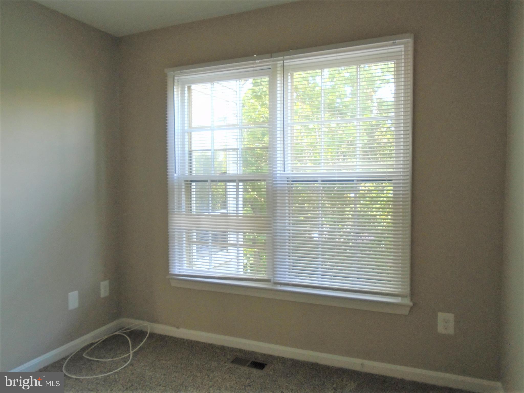 1914 Duffield Lane Alexandria, VA 22307 - Photo 23 of 50 a view of an empty room with a window