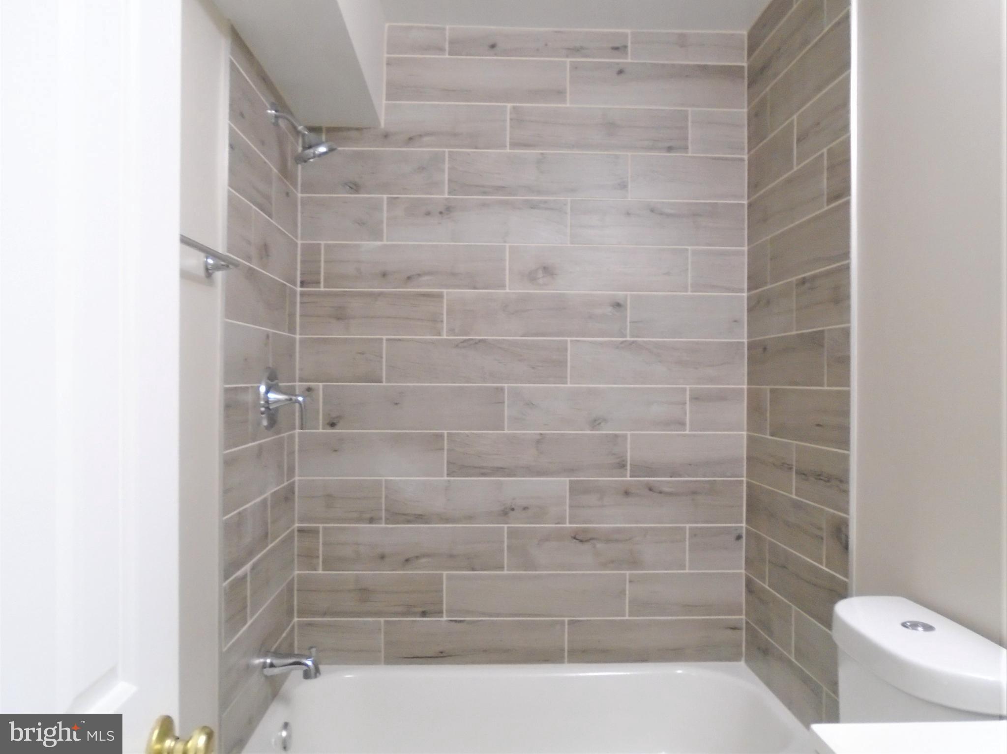 1914 Duffield Lane Alexandria, VA 22307 - Photo 25 of 50 a bathroom with a shower