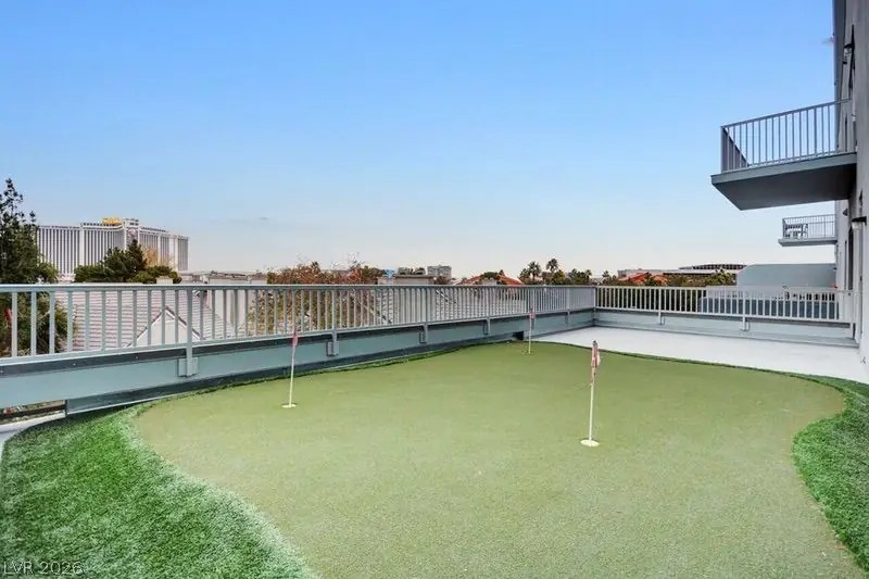 360 East Desert Inn Road, Unit 507 Las Vegas, NV 89109 - Photo 33 of 37 An elevated putting green overlooks the neighborhood from a spacious private terrace.