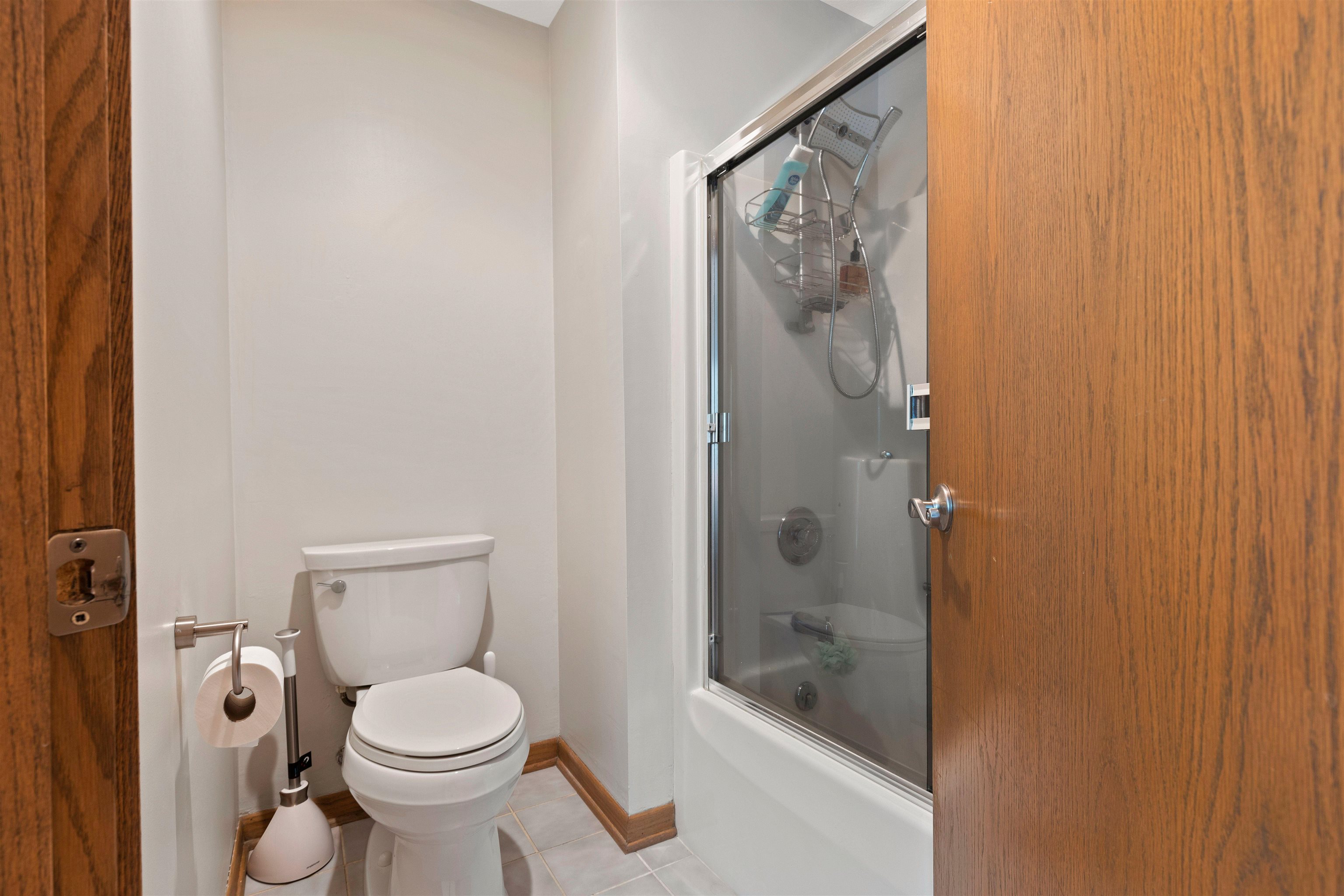 8024 Killarney Aire Road Roscoe, IL 61073 - Photo 21 of 45 a bathroom with a toilet and shower