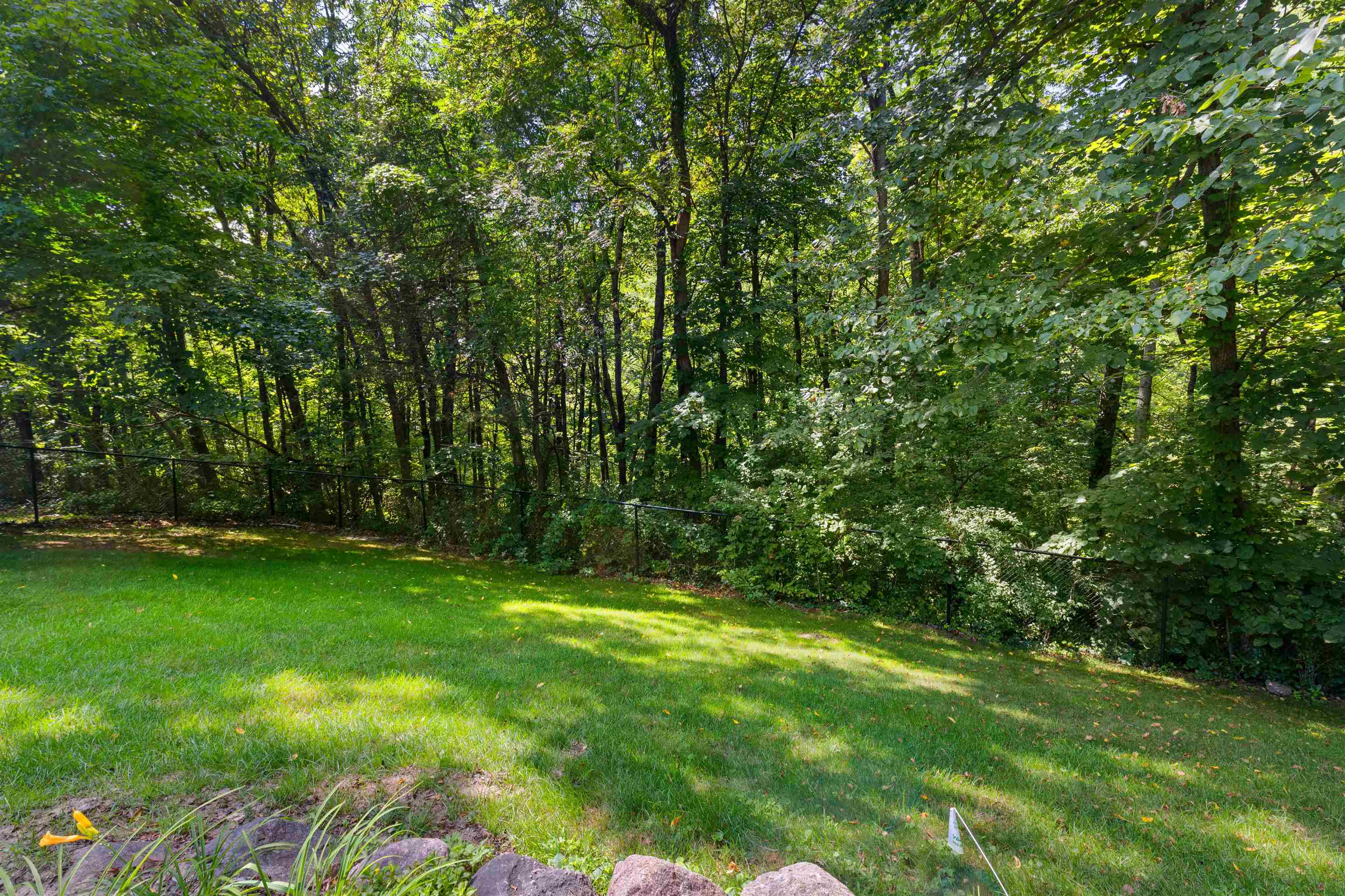 8024 Killarney Aire Road Roscoe, IL 61073 - Photo 44 of 45 a view of a yard with a trees