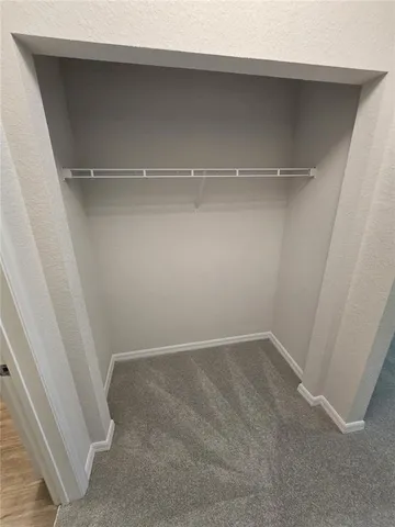 an empty room with closet