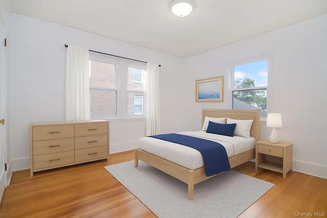 a bed room with a bed and a window