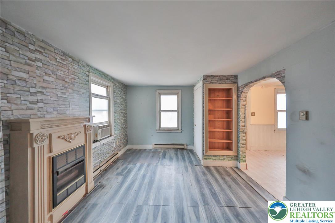 1291 Seidersville Road Bethlehem, PA 18015 - Photo 16 of 56 wooden floor in an empty room with a window