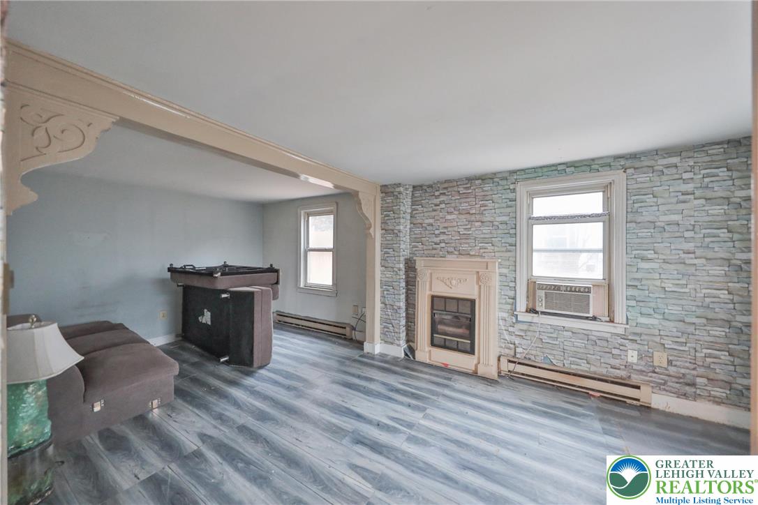 1291 Seidersville Road Bethlehem, PA 18015 - Photo 18 of 56 a view of a livingroom with furniture and a fireplace