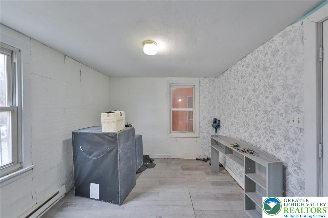 1291 Seidersville Road Bethlehem, PA 18015 - Photo 22 of 56 a room with a table and a chair