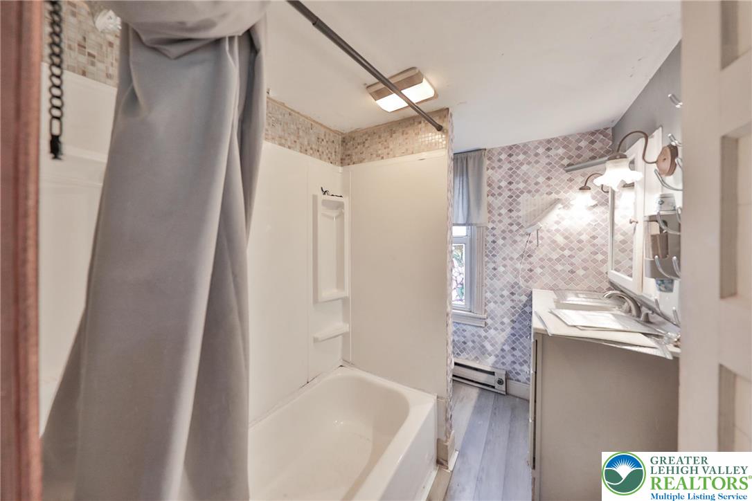 1291 Seidersville Road Bethlehem, PA 18015 - Photo 25 of 56 a bathroom with a bathtub and a shower