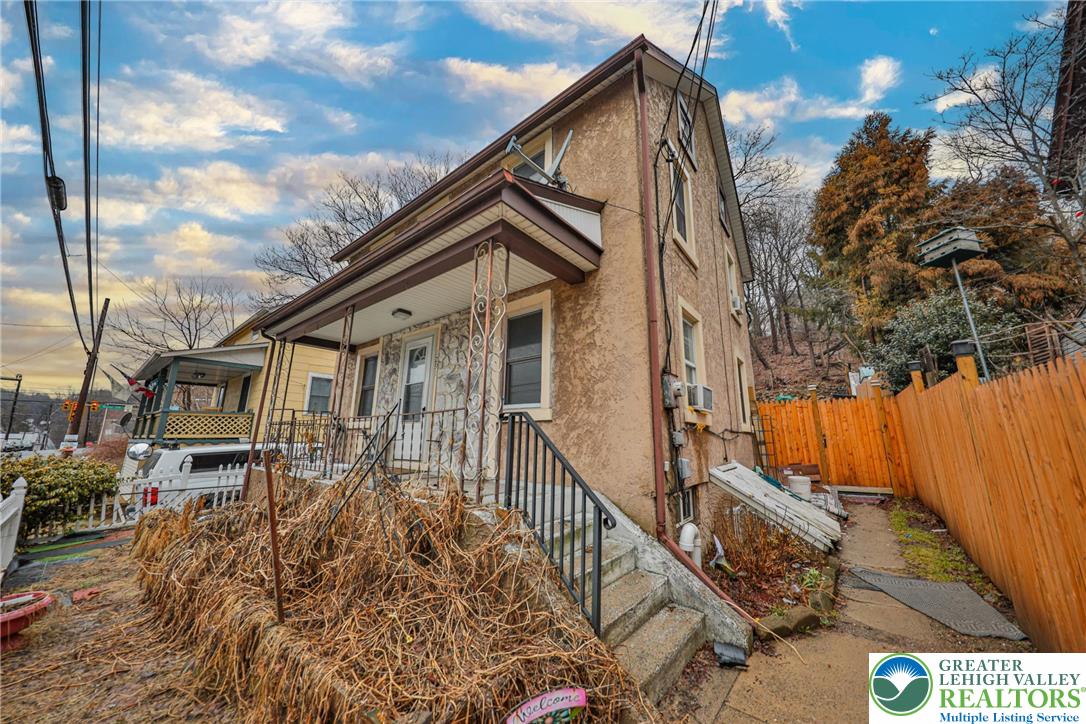 1291 Seidersville Road Bethlehem, PA 18015 - Photo 3 of 56 a backyard of a house with table and chairs