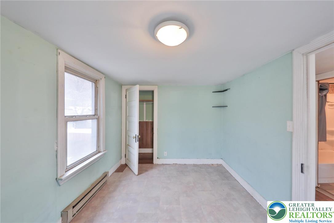1291 Seidersville Road Bethlehem, PA 18015 - Photo 35 of 56 a view of an empty room with a window and closet area