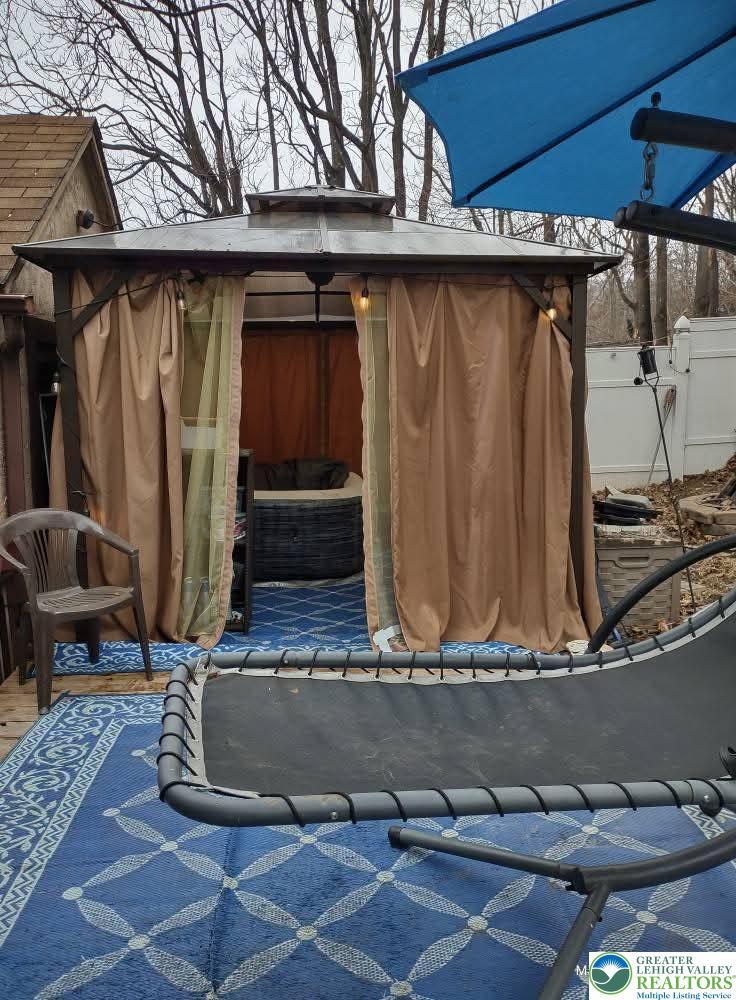 1291 Seidersville Road Bethlehem, PA 18015 - Photo 53 of 56 a room with water heater and wooden cabinets