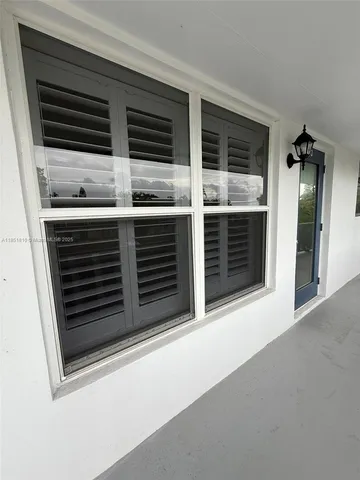 front view of a house with a small yard