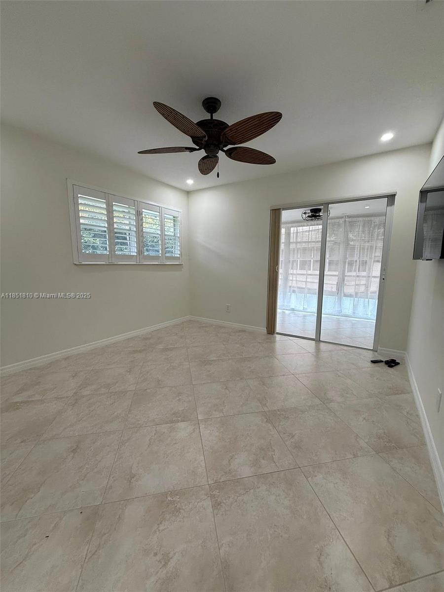 2929 Southeast Ocean Boulevard, Unit 14310 Stuart, FL 34996 - Photo 18 of 73 a view of an empty room with a window