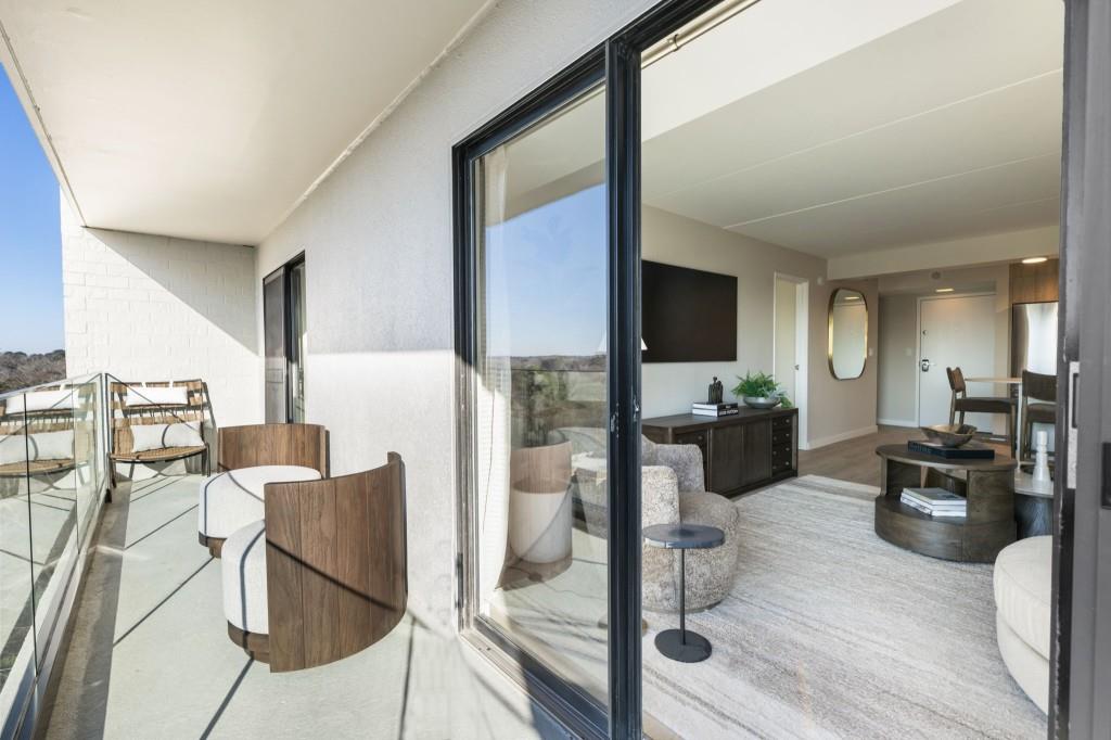 2460 Peachtree Road Northeast, Unit 514 Atlanta, GA 30305 - Photo 16 of 36 a living room with furniture