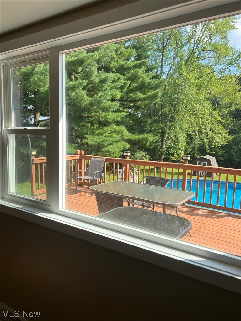 294 Lester Road New Franklin, OH 44319 - Photo 9 of 24 Wooden deck with pool