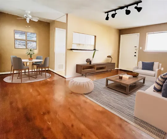 a living room with furniture and a table