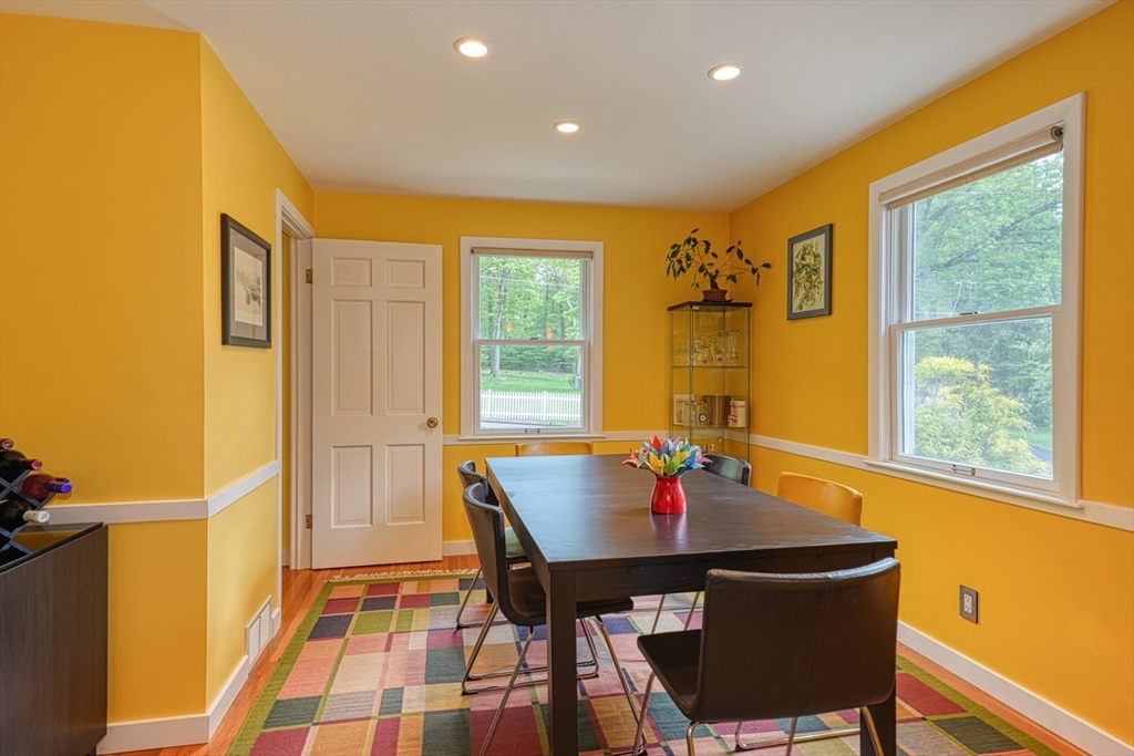 27 Wheeler Road Westborough, MA 01581 - Photo 15 of 41 a view of a dining room with a table and chairs