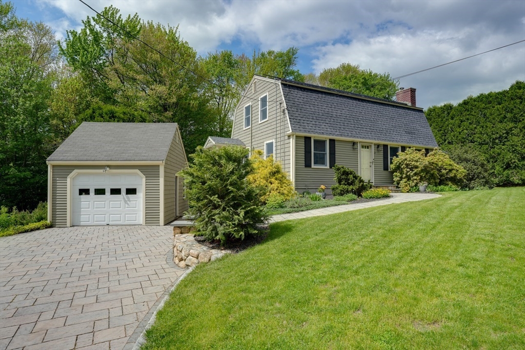 27 Wheeler Road Westborough, MA 01581 - Photo 2 of 41 a front view of a house with a yard