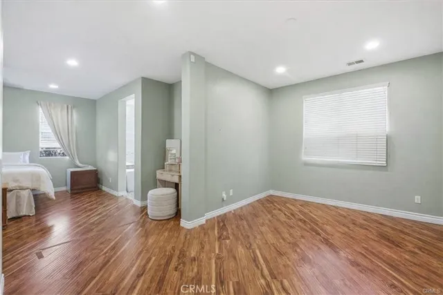 a view of livingroom with furniture and wooden floor