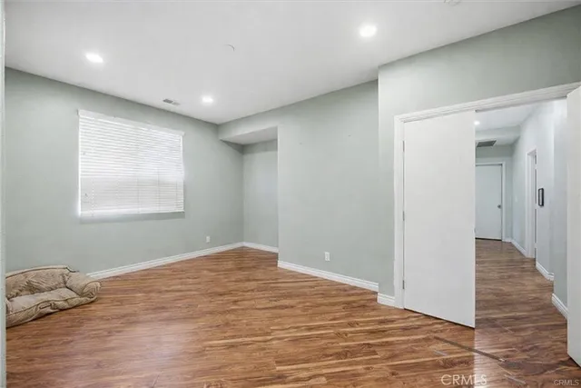 a room that has a bed and a window