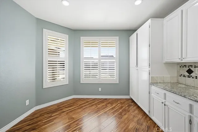 a view of a kitchen with marble kitchen and sink