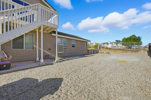 a view of a house with a patio