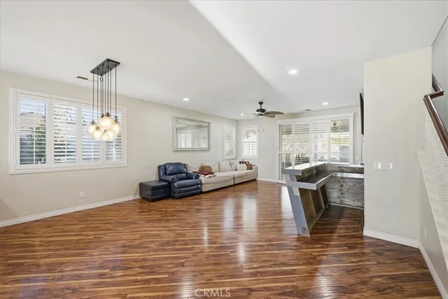 a view of a living room and dining room