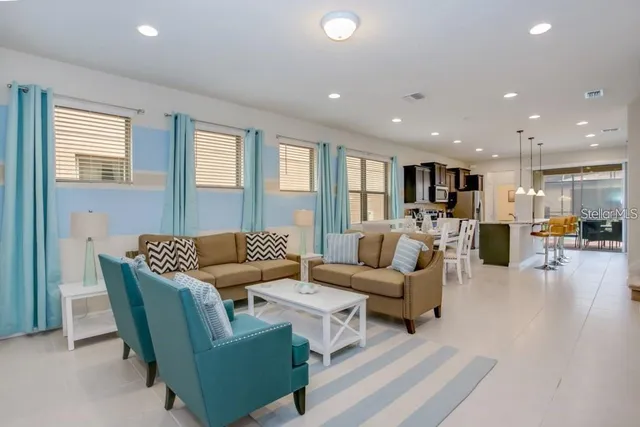 a living room with furniture and a table