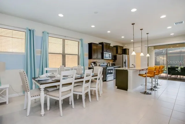 a view of a dining room with furniture