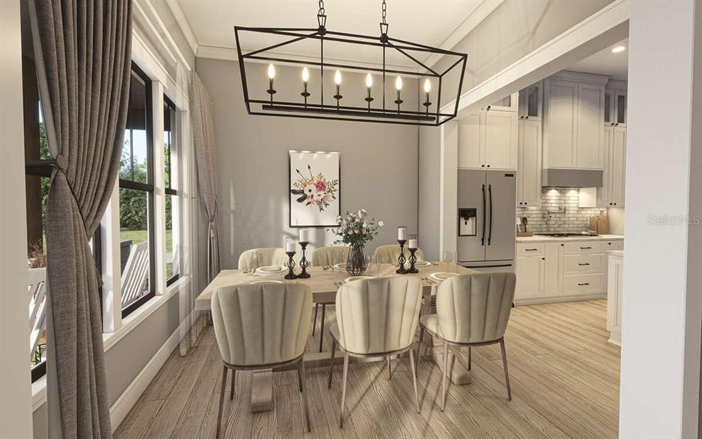 34710 Clayton Road Dade City, FL 33523 - Photo 12 of 17 a view of a dining room with furniture window and wooden floor