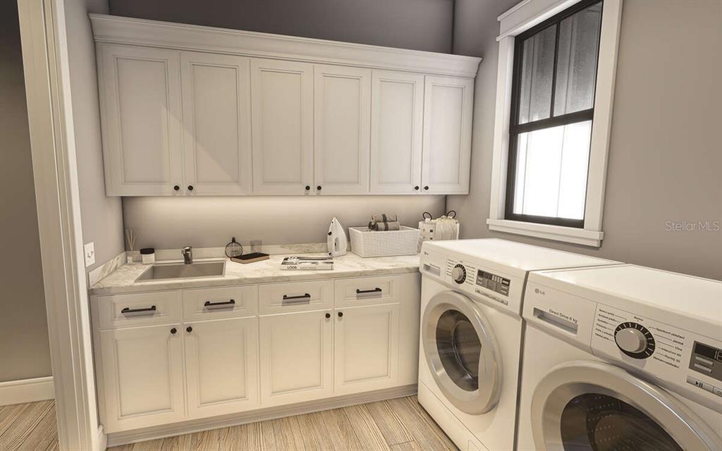 34710 Clayton Road Dade City, FL 33523 - Photo 7 of 17 a utility room with dryer and washer