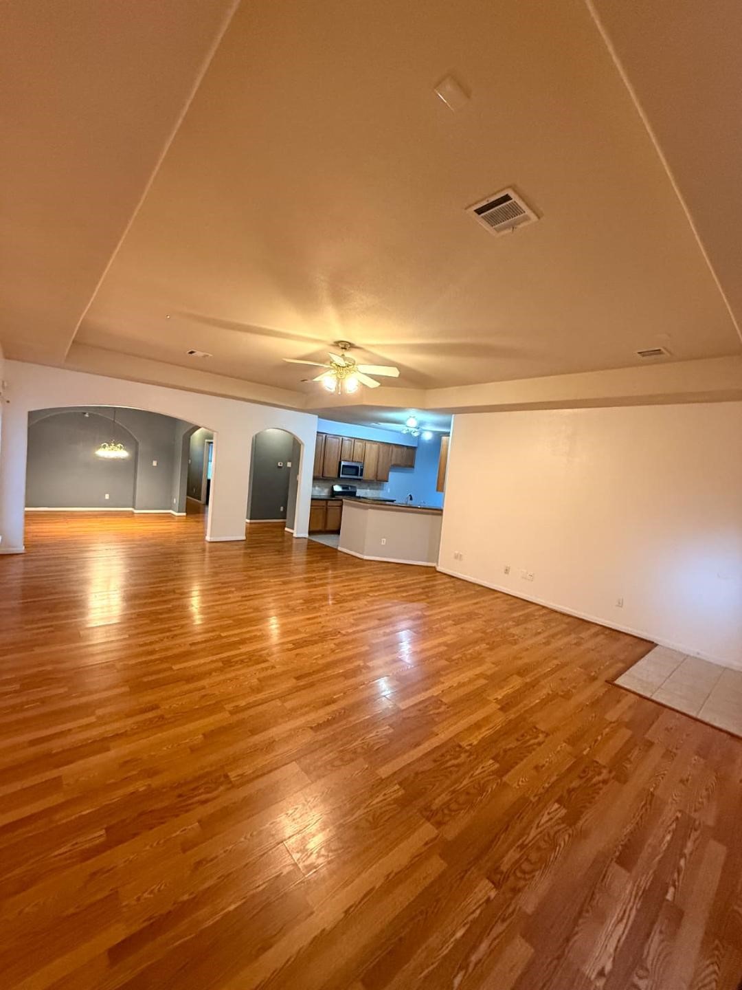 10110 Gil Jr Lane Houston, TX 77075 - Photo 5 of 11 a view of a room with wooden floor